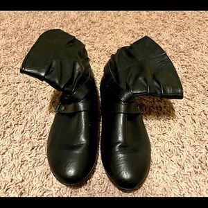 Woman’s black boots